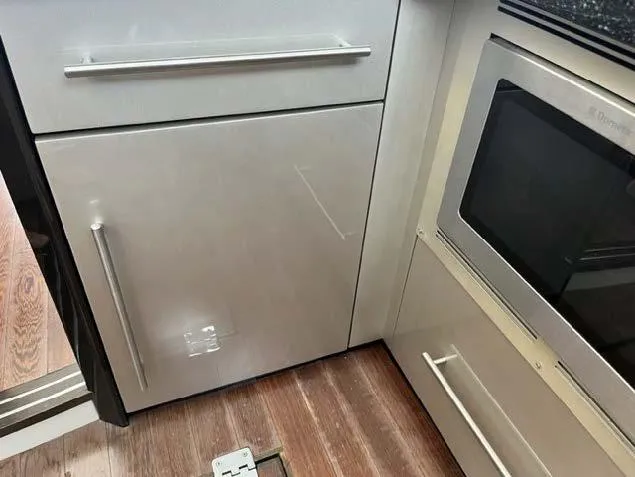 Slide: The Image of Modern kitchen area in a 2008 Marquis 40 SC yacht with stainless steel appliances. - 38