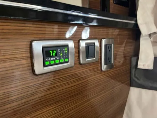 Slide: The Image of Control panel and outlets on 2008 Marquis 40 SC yacht interior. - 42