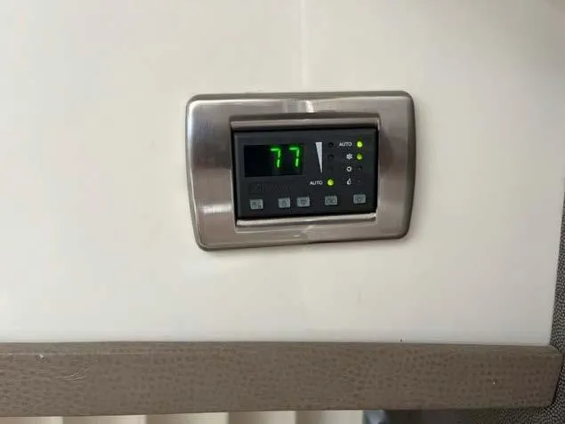 Slide: The Image of Digital thermostat display in a 2008 Marquis 40 SC yacht. - 43