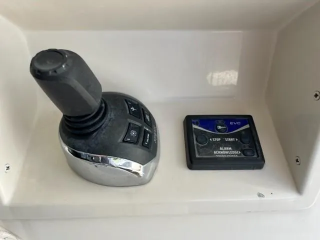 Slide: The Image of Joystick control and alarm panel of a 2008 Marquis 40 SC yacht. - 6