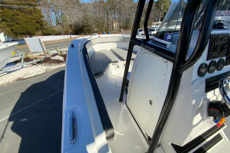 Slide: The Image of 2020 Aquasport 2500 Center Console boat with sleek design and modern dashboard. - 22