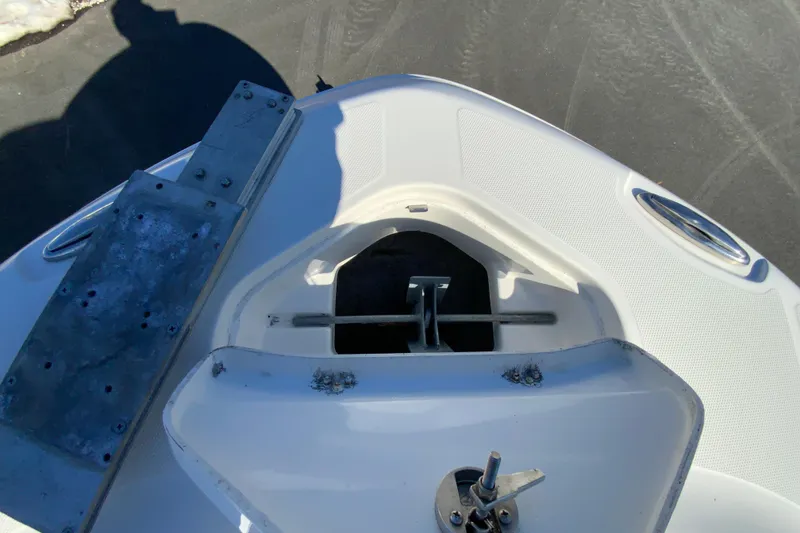 Slide: The Image of 2020 Aquasport 2500 Center Console boat anchor compartment detail. - 24