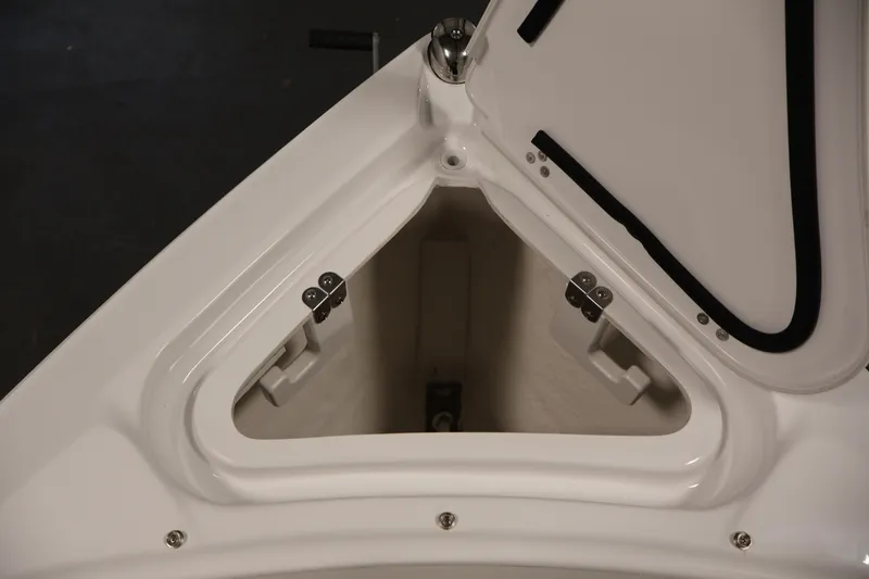 Slide: The Image of Open storage compartment on 2026 Four Winns H4 Freedom boat. - 11