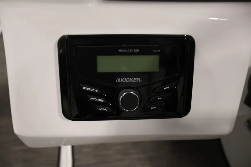 Slide: The Image of Kicker media center in 2026 Four Winns H4 Freedom boat dashboard. - 21