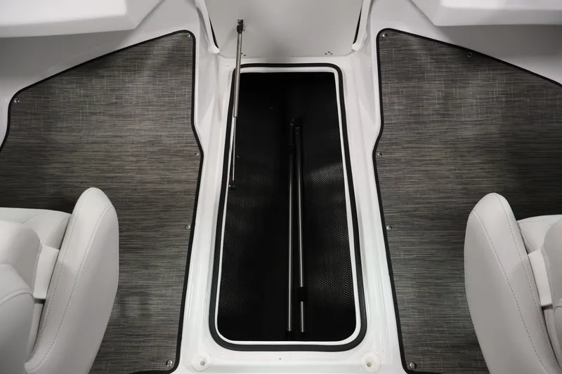 Slide: The Image of Interior view of 2026 Four Winns H4 Freedom boat storage compartment. - 28