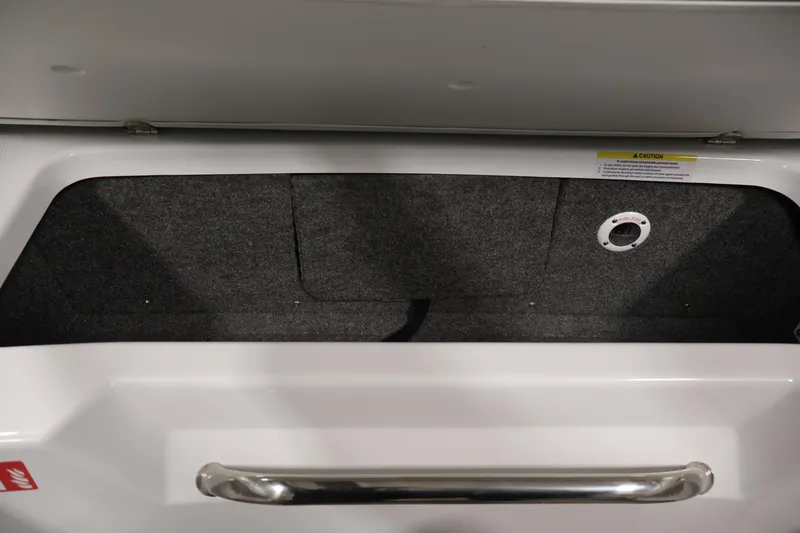 Slide: The Image of Storage compartment of 2026 Four Winns H4 Freedom boat, featuring a sleek handle design. - 30