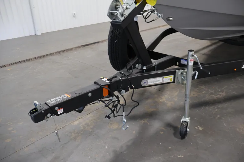 Slide: The Image of Trailer hitch of 2026 Four Winns H4 Freedom boat in a garage setting. - 38