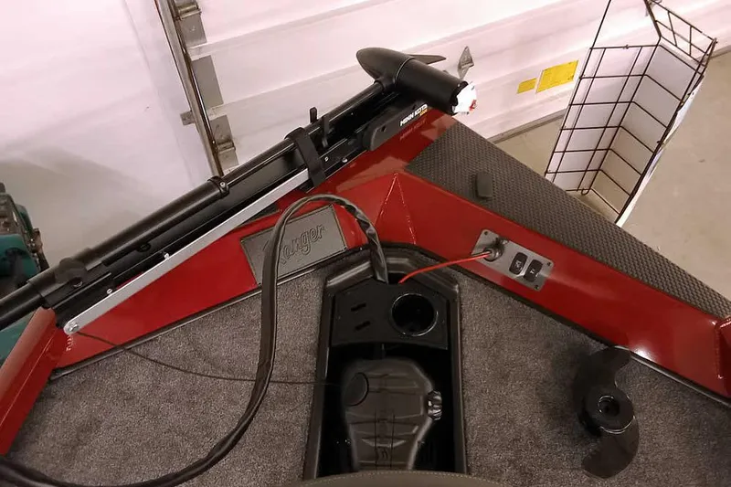 Slide: The Image of 2026 Ranger RT188 boat interior with trolling motor and control panel. - 14