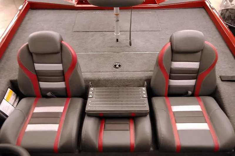 Slide: The Image of 2026 Ranger RT188 boat interior with three gray and red seats. - 16