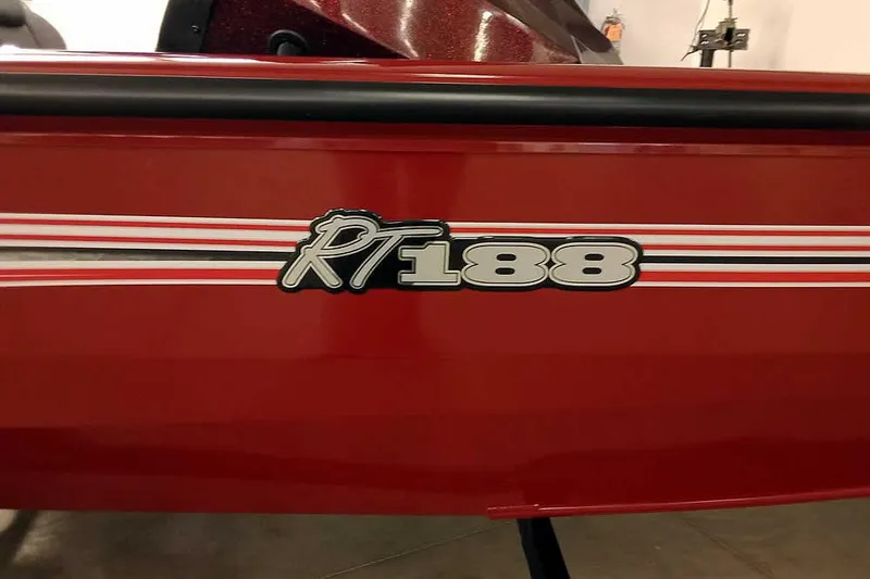 Slide: The Image of Red 2026 Ranger RT188 boat with bold logo and stripe design. - 2
