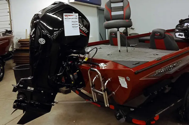 Slide: The Image of 2026 Ranger RT188 boat with Mercury outboard motor in showroom. - 6