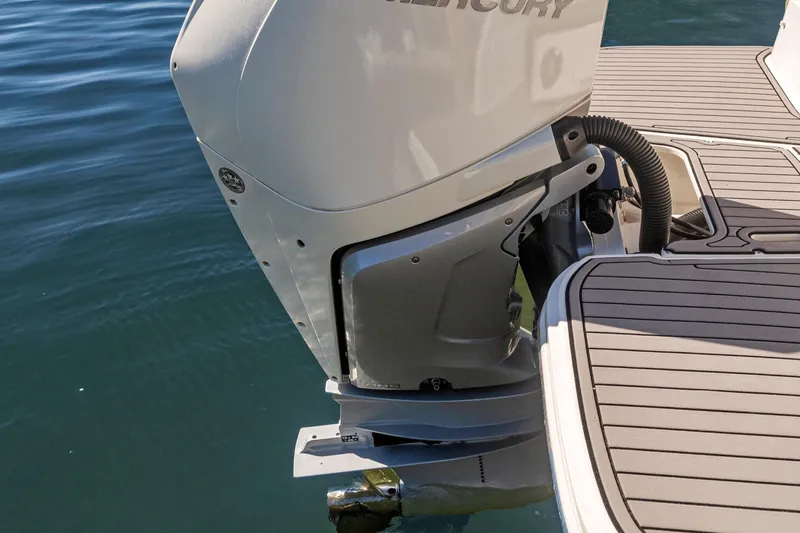 Slide: The Image of 2023 Sea Ray SDX 250 Outboard motor on water, showcasing sleek design. - 19