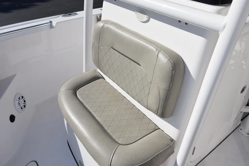 Slide: The Image of 2021 Sportsman Heritage 241 Center Console boat seat with diamond-stitched upholstery. - 14
