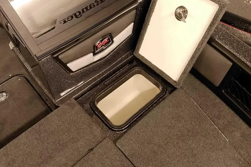 Slide: The Image of 2026 Ranger 2050MS Reata boat interior storage compartment with open hatch. - 17