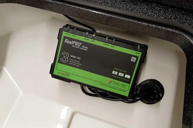 Slide: The Image of RealPRO Series battery charger in 2026 Ranger 2050MS Reata boat compartment. - 20