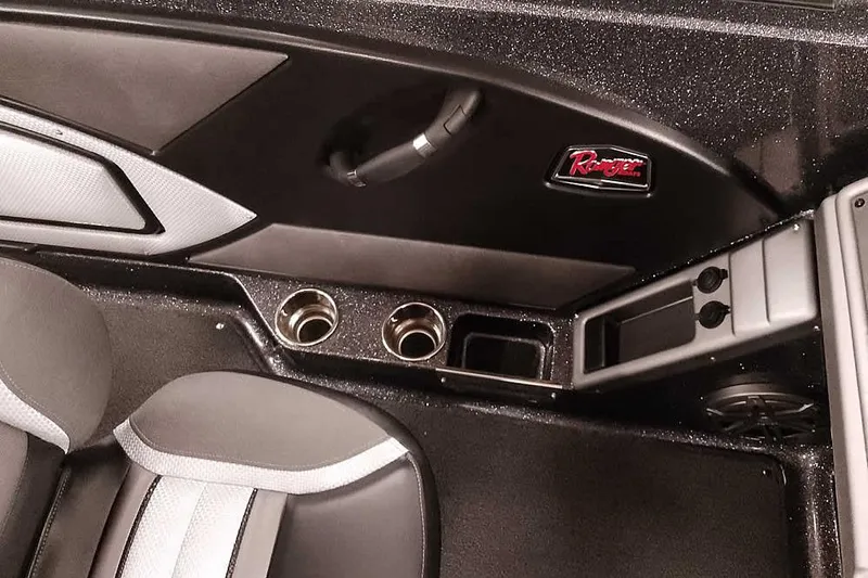 Slide: The Image of Interior of 2026 Ranger 2050MS Reata boat with cup holders and sleek design. - 28