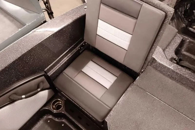 Slide: The Image of 2026 Ranger 2050MS Reata boat seat with sleek, modern design and cup holder. - 39