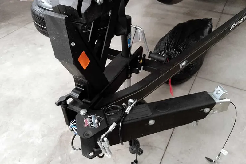 Slide: The Image of Trailer hitch of 2026 Ranger 2050MS Reata boat on concrete floor. - 44