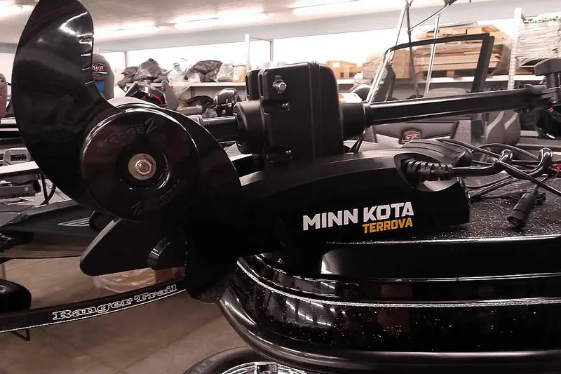 Slide: The Image of 2026 Ranger 2050MS Reata with Minn Kota Terrova trolling motor in a showroom. - 5