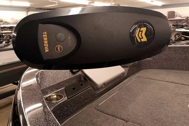 Slide: The Image of 2026 Ranger 2050MS Reata boat with Terrova trolling motor in a showroom. - 6