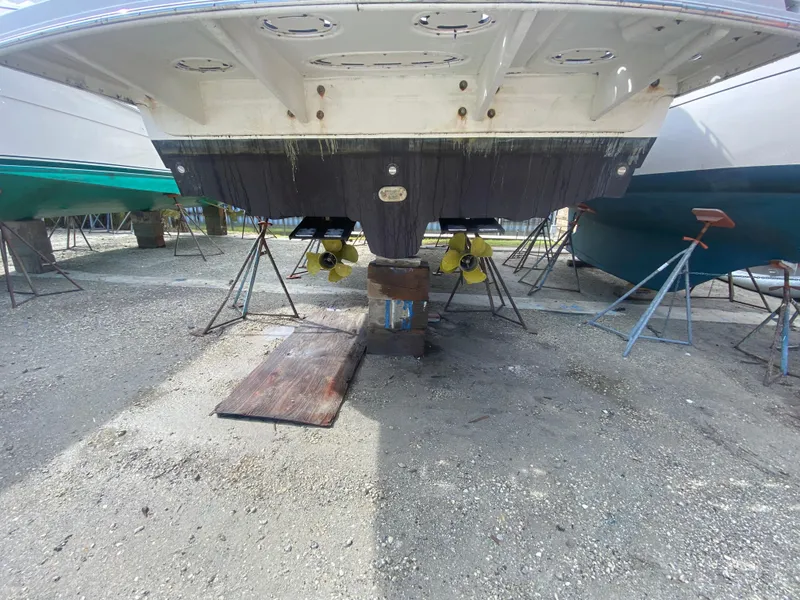 Slide: The Image of Underneath view of a 2012 Sea Ray 450 Sundancer boat on dry dock. - 46