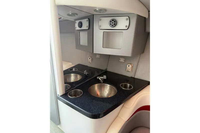 Slide: The Image of 2007 Formula 353 FASTech cabin interior with sink and storage compartments. - 20