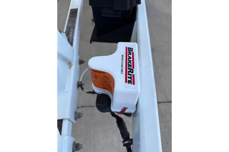 Slide: The Image of BrakeRite brake fluid reservoir on 2007 Formula 353 FASTech trailer. - 23