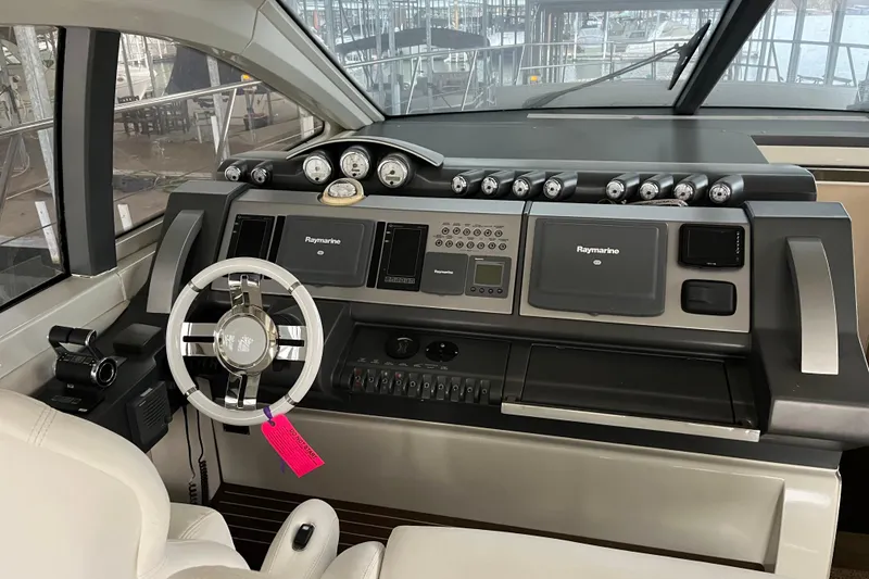 Slide: The Image of Cockpit of 2006 Azimut 68S yacht with Raymarine navigation system and modern controls. - 4