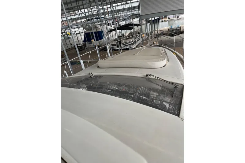 Slide: The Image of 2006 Azimut 68S yacht in covered dock, top view. - 6