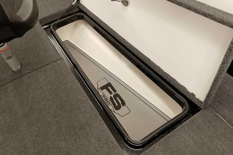 Slide: The Image of 2026 Ranger 622FS Pro boat storage compartment with FS Pro branding. - 16