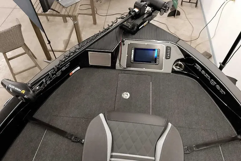 Slide: The Image of 2026 Ranger 622FS Pro boat interior with advanced navigation system and seating. - 19