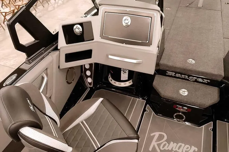 Slide: The Image of 2026 Ranger 622FS Pro boat interior with sleek seating and modern dashboard design. - 23