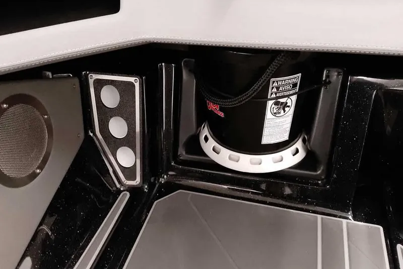 Slide: The Image of Interior of 2026 Ranger 622FS Pro boat, featuring speaker and storage compartment. - 24