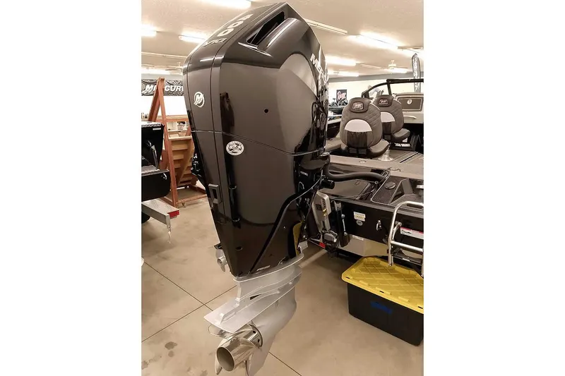 Slide: The Image of 2026 Ranger 622FS Pro boat with powerful outboard motor in showroom. - 3