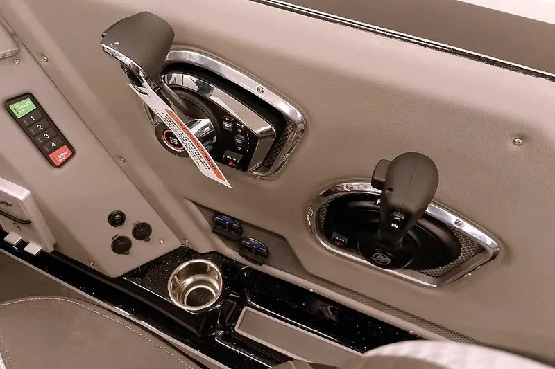 Slide: The Image of 2026 Ranger 622FS Pro boat interior controls and cup holder detail. - 30