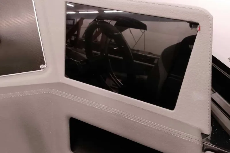 Slide: The Image of 2026 Ranger 622FS Pro dashboard with sleek design and modern steering wheel. - 32