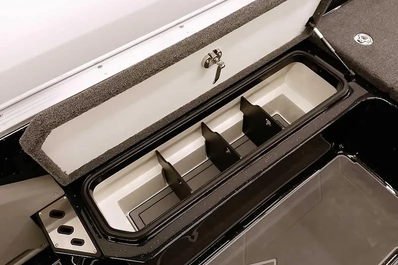 Slide: The Image of 2026 Ranger 622FS Pro boat storage compartment with secure lock and organized interior. - 34