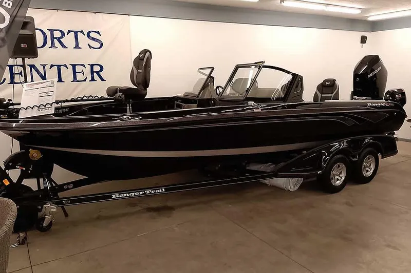 Slide: The Image of 2026 Ranger 622FS Pro boat displayed indoors on a trailer. - 42