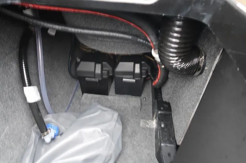 Slide: The Image of 2025 MasterCraft XT22 boat interior wiring and components detail. - 27