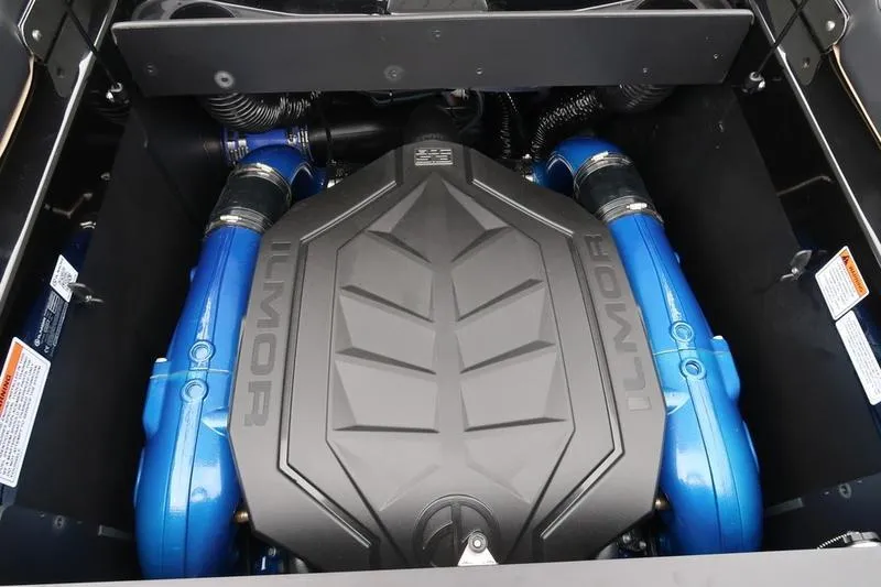 Slide: The Image of 2025 MasterCraft XT22 engine with blue Ilmor components, showcasing advanced marine engineering. - 32