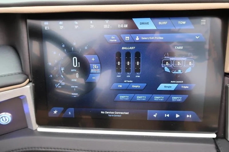 Slide: The Image of 2025 MasterCraft XT22 touchscreen display showing drive, surf, and tow settings. - 39