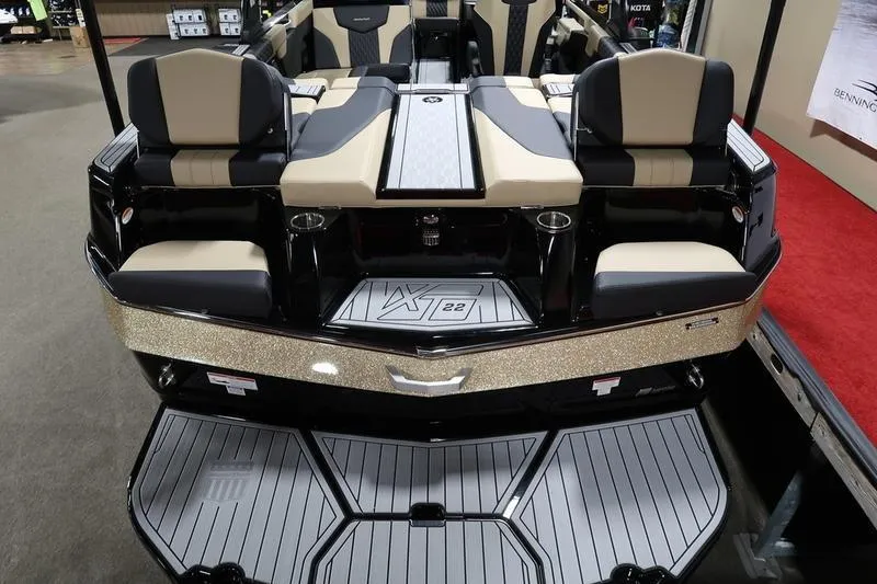 Slide: The Image of 2025 MasterCraft XT22 boat interior with luxurious seating and modern design. - 68