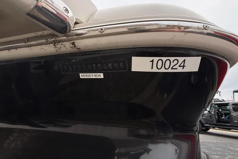 Slide: The Image of 2006 Monterey 228SI Montura Bowrider boat hull with identification numbers visible. - 3