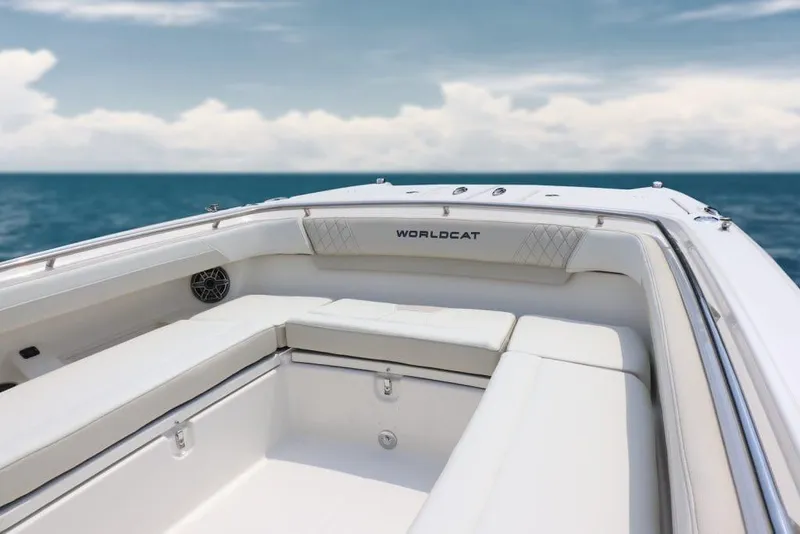 Slide: The Image of Manufacturer Provided Image: 2026 World Cat 280 CC-X boat interior with white seating, ocean view, and clear sky. - 4