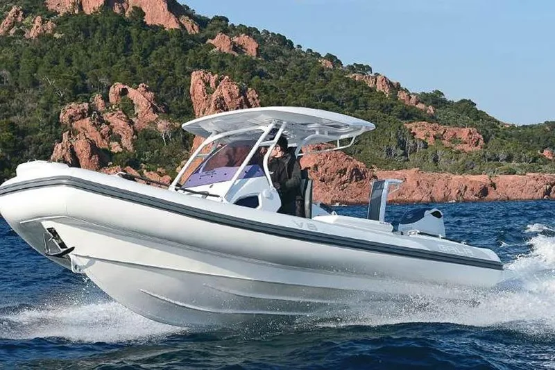 Slide: The Image of 2026 Gala V8 boat cruising on blue waters near rocky coastline. - 4