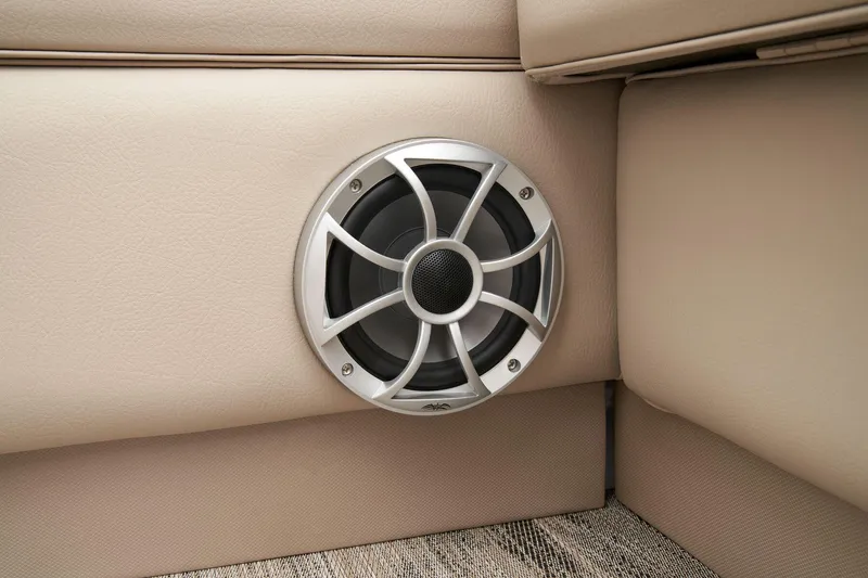 Slide: The Image of 2026 Ranger Reata 220FC boat interior with steering wheel and seating. - 24