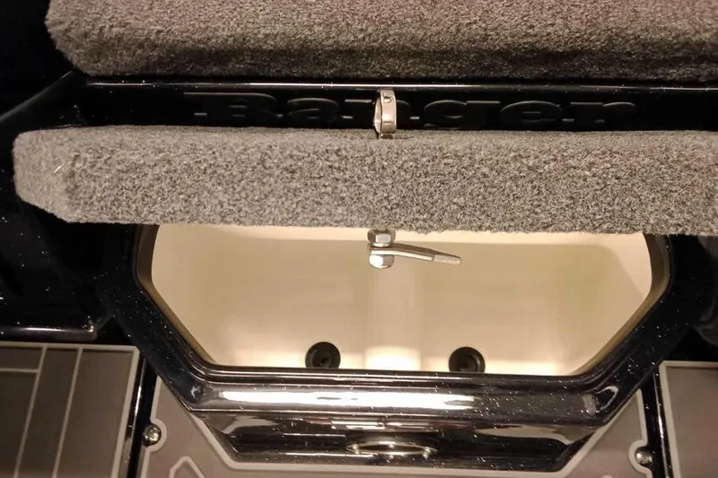 Slide: The Image of Interior view of 2026 Ranger 620xFS Pro boat compartment with carpeted lid. - 18