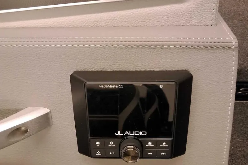 Slide: The Image of JL Audio MediaMaster 55 installed in 2026 Ranger 620xFS Pro boat interior. - 21