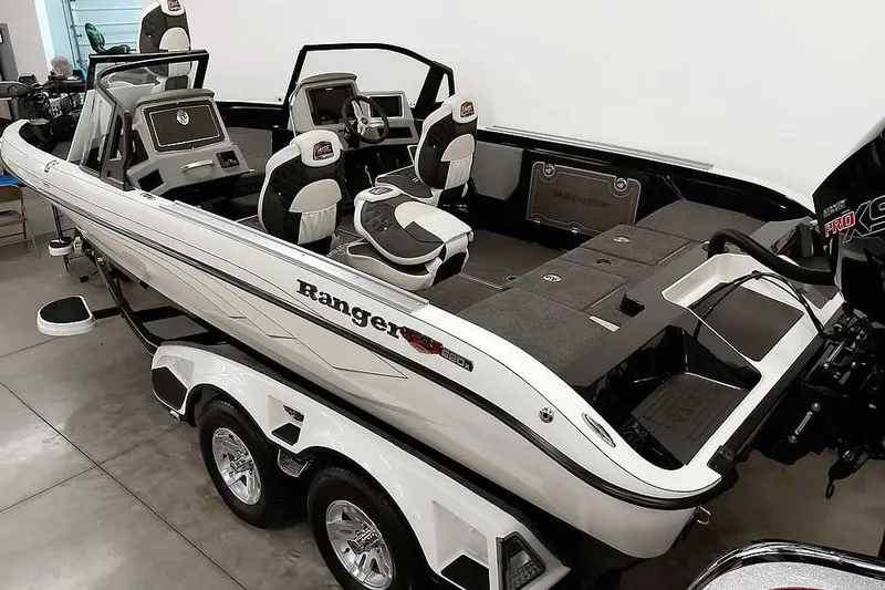 Slide: The Image of 2026 Ranger 620xFS Pro boat with sleek design and modern features in showroom. - 39