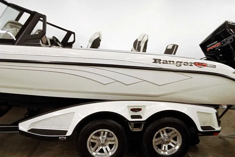 Slide: The Image of 2026 Ranger 620xFS Pro boat on trailer, featuring sleek design and modern features. - 7